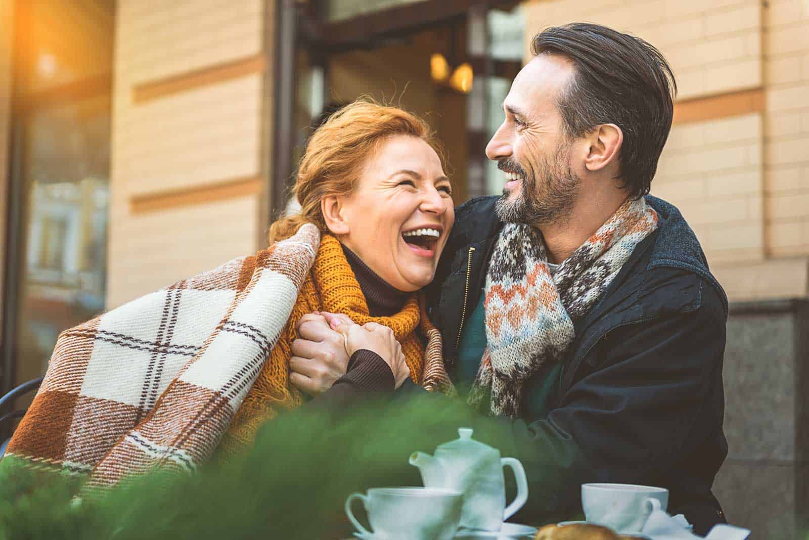 a man and woman laughing