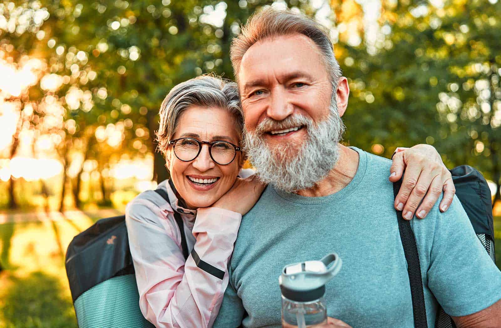 a man and woman smiling for a picture